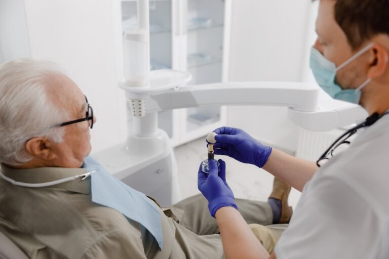 Old men patient have a check appointment at dental clinic